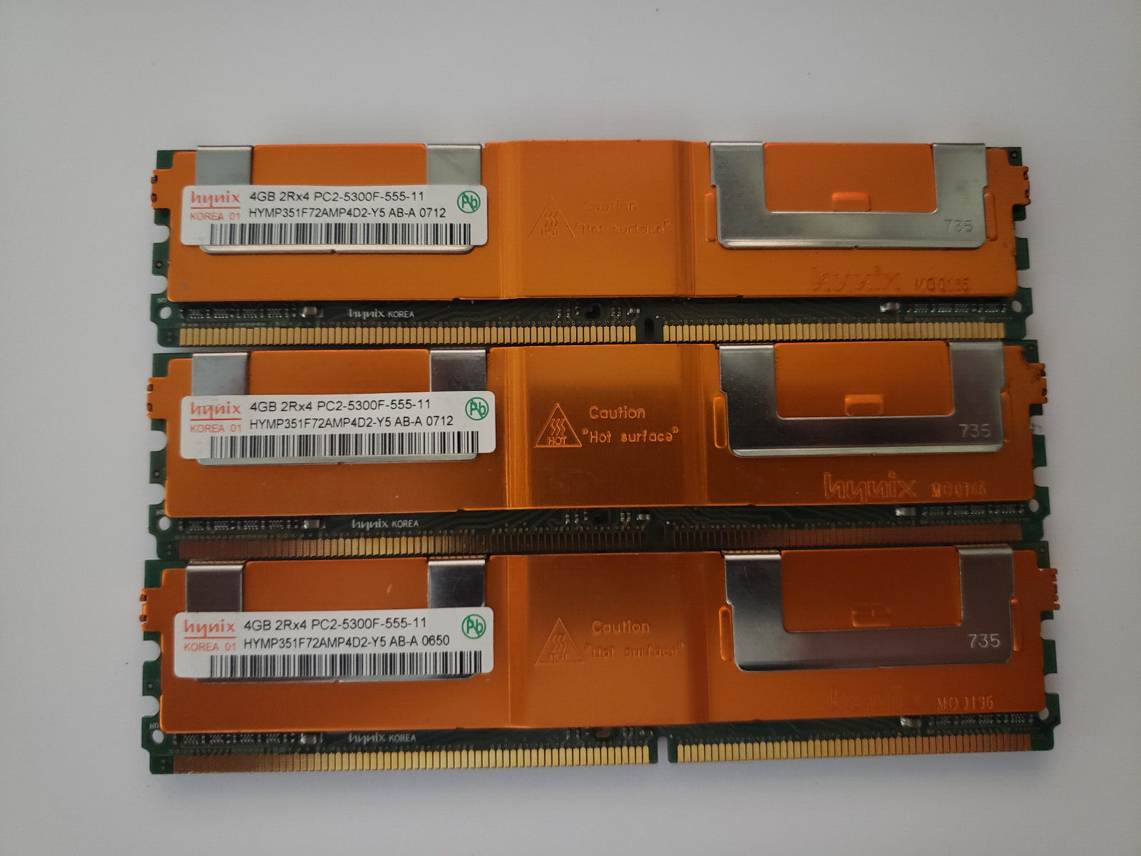 Hynix HYMP351F72AMP4D2-Y5 Orange 5300F 12GB (3X 4GB) DDR2 2RX8 - Photo 1